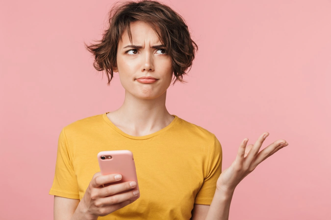 confused woman with phone