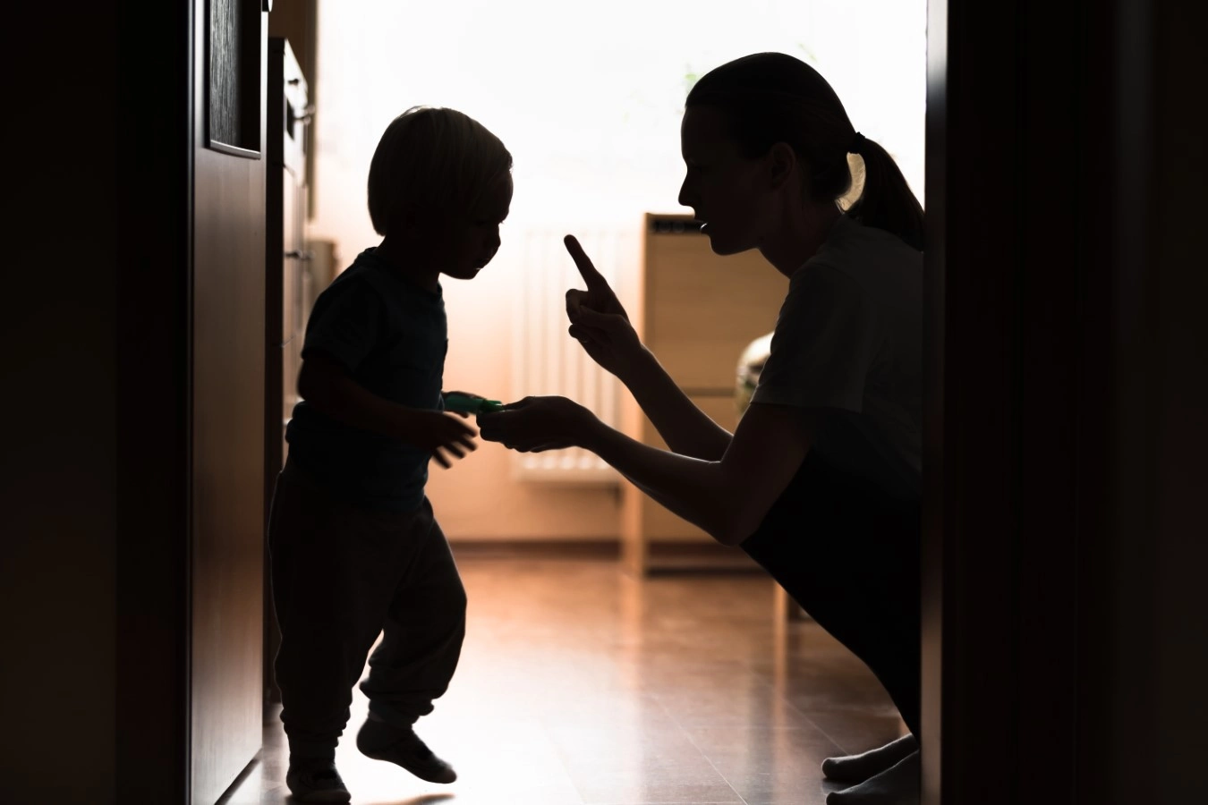 mother disciplining child