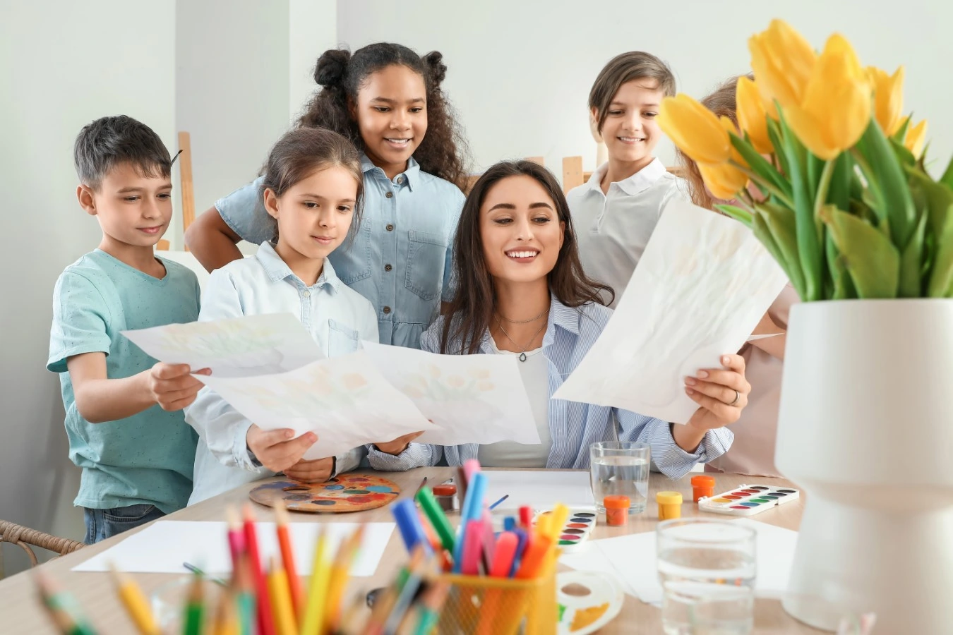 teacher with students happy