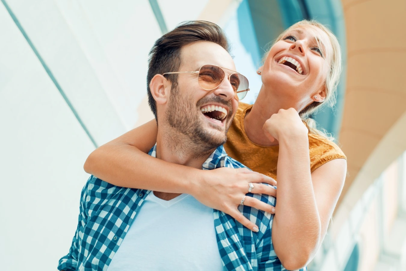 woman laughing at man